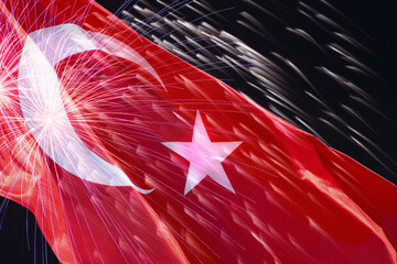waved Turkish flag against fireworks in night sky