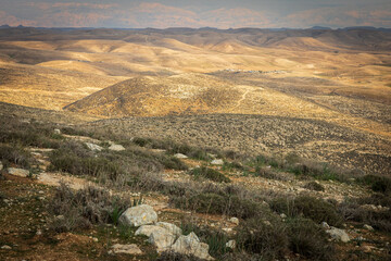 Old beguin cemetery graveyard ruins, hills mountain ridge scenic landscape view, Arif crater Negev desert, travel Israel nature.