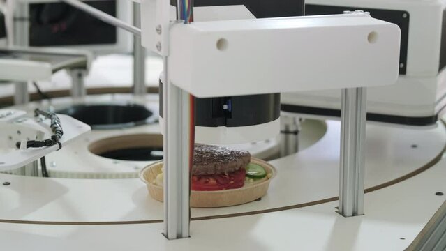 Automatic machine messing up burger production