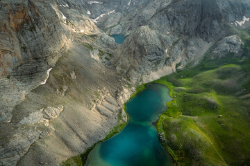 Beautiful aerial view of glacier lake by mountain