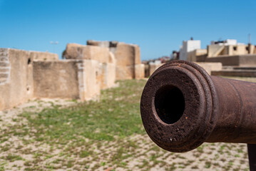 Fototapeta na wymiar Cannon at the city wall of medieval district of El Jadida in Morocco