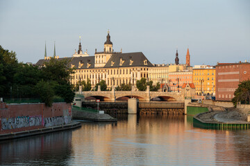 Wroclaw, Poland - June 02, 2023: Cityscape on city buildings across the river and bridge in Wroclaw, Poland