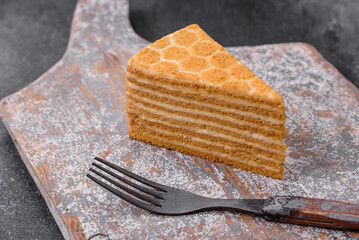 Delicious fresh sweet honey cake layer cake with white cream