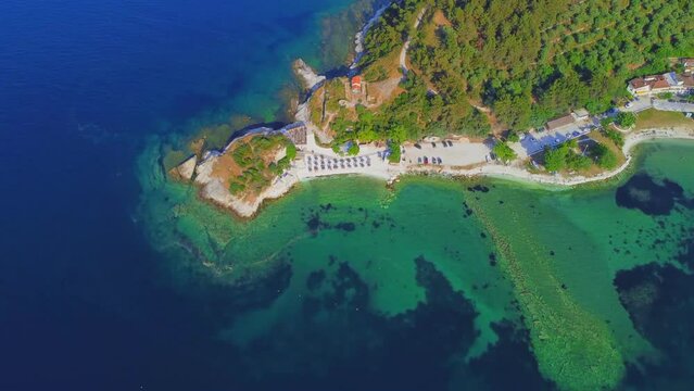 Aerial view of beach and rocks in Limenas, Thassos island, Greece