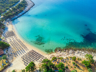 Aerial view of sand beach, azure sea. Psili Ammos Beach, Thassos, Greece