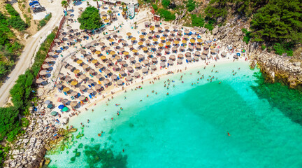 Beach with turquoise sea and umbrellas. Marble Beach, Thassos, Greece