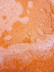Wet orange texture backgroudn or backdrop