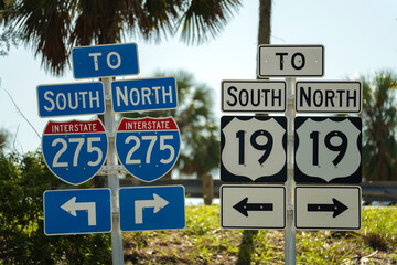 Fototapeta premium Blue direstional road sign indicating direction to I-275 freeway interstate highway serving the Tampa Bay area in Florida