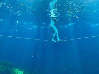 Underwater Tight rope walker in cenote