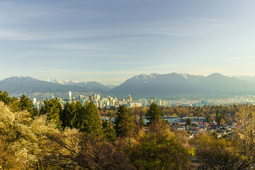 Skyline of Vancouver city with parks and mountains