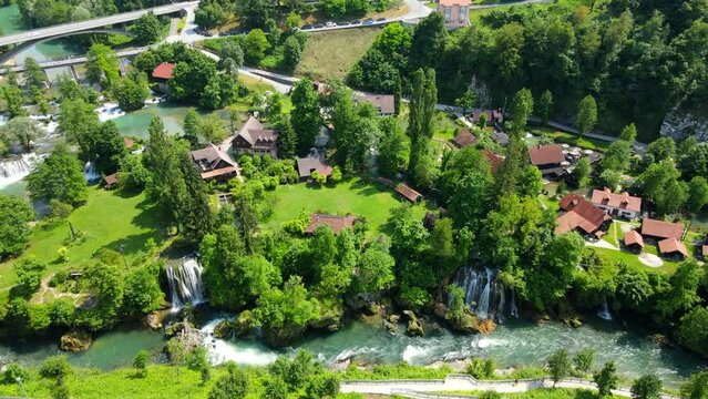 Aerial shot drone flies high over river next to Rastoke, Slunj, Croatia