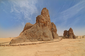 Fototapeta na wymiar Rock carving depicting the so-called crying cow in the Algerian desert Sahara