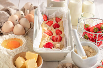Delicious strawberry yeast cake with fruits and crumble.