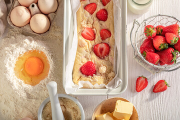 Homemade strawberry yeast cake made of yeast dough.