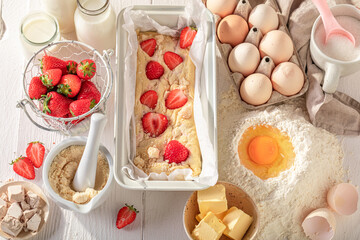 Homemade strawberry yeast cake with fruits and crumble.