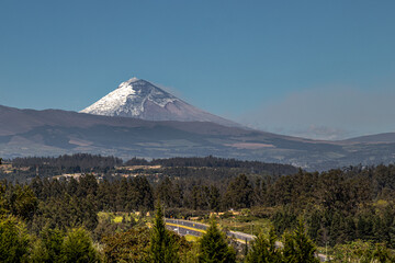 View of the Cotopaxi volcano on a morning with a completely clear summer sky from the city of Quito - Ecuador.