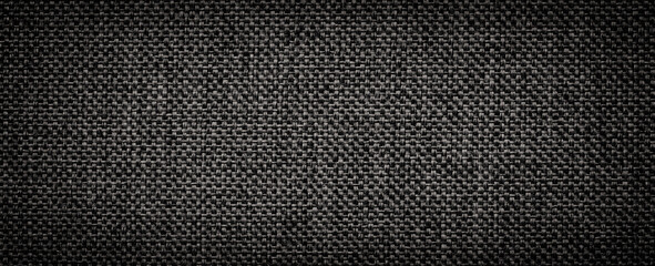 texture of black knitwear, natural fabric as a design element