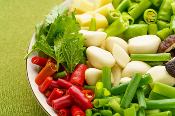 Variety of chopped side dishes on a monochrome background