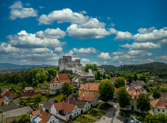 Aerial view of Rabi castle, largest medieval fortress ruin in the Czech Republic with concentric walls and round towers