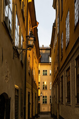 Fototapeta na wymiar Stockholm, Sweden A narrow cobblestones street in Gamla Stan or Old Town on Ankargrand.