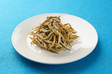 Salted anchovies on a monochrome background