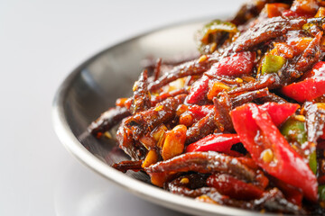 Spicy small whitebait with Northeast local special dish on monochrome background