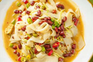 Special Chinese food Liangpi noodle on a monochrome background