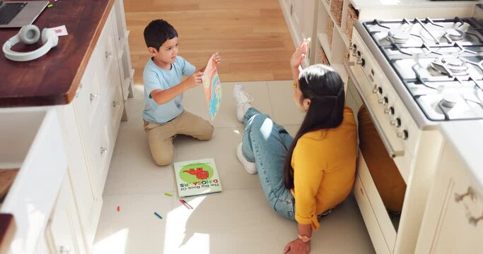 Learning, high five and mother with child drawing on floor for celebration, achievement and goal. Education, art and mom and kid with hands together for success in homeschool to study in kitchen.