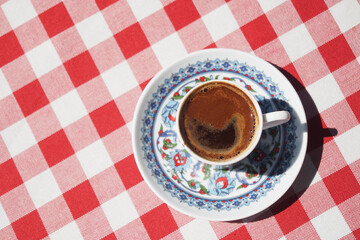 a cup of turkish coffee on table outdoor