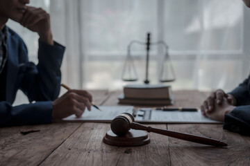 Team meeting at law firm, Business people discussion advisor concept, Non-reciprocal contract, Default, Earnest, Delict/tortious actions, Personally or Several liability, Defense of a prescription