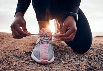 Shoes, fitness and person typing laces ready for outdoor exercise, workout or hiking for health and...