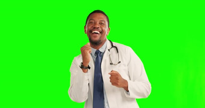 Happy black man, doctor and dance on green screen in winning celebration against a studio background. Portrait of African male person, medical or healthcare worker enjoying success on mockup space