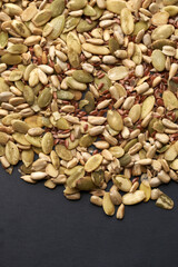 Cereal Mix of flax seeds, sesame, sunflower and pumpkin seeds close up