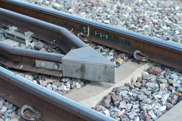 Train tracks in rural scene. Railroad in the park. vintage railroad close up.