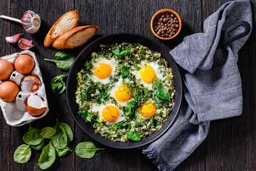 green shakshuka in frying pan, top view
