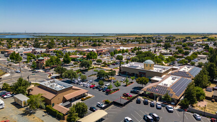 Stunning aerial views capture vibrant Downtown Oakley, California, showcasing its architectural...