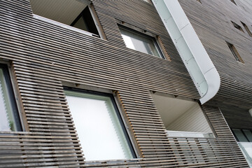 Architectural details of modern appartments - windows and wood cladding - Harbor - Tromso - Norway