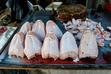 Fresh raw whole chicken meat in traditional market