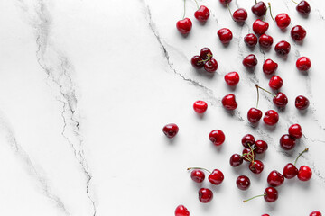 Many sweet cherries on white background