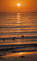 Fototapeta na wymiar Surfer sunset at the beach