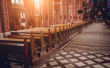 Rows of church benches at the old european catholic church.