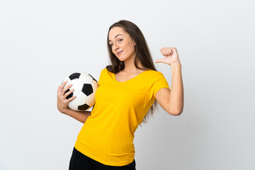 Young football player woman over isolated white background proud and self-satisfied