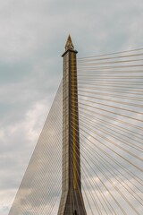 A vertical shot of a historic beautiful suspension bridge in Bangkok, Thailand