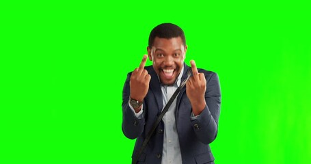 Green screen, middle finger and happy black man excited, funny and a goofy joke by businessman in studio background. Silly, smile and portrait of person with rude hand gesture or sign for comedy