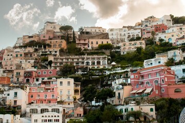Fototapeta na wymiar Scenic aerial view of a residential neighborhood tucked away in the hills of Positano, Italy