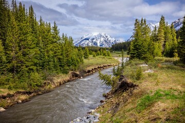 Fototapeta na wymiar Scenic view of a river winding through a mountainous landscape