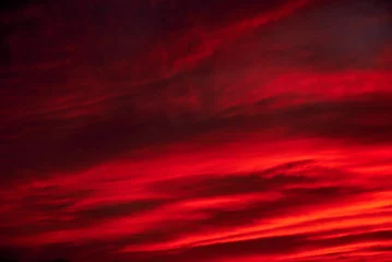 Acrylglasbilder Braun A sunset heaven, orange sky. Sun Rays  © Raul