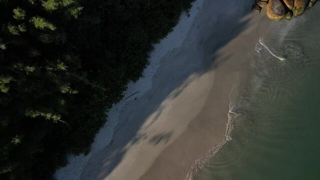 Zoom out of the beach in Florianopolis in Brazil