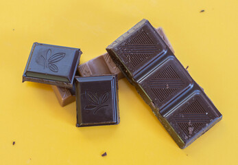 world chocolate day .pieces of chocolate on white background,