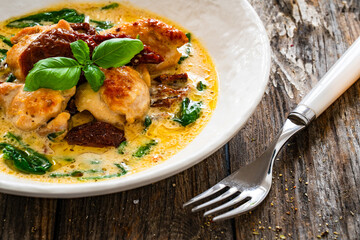 Creamy Tuscan chicken with parmesan and sun dried tomatoes.
